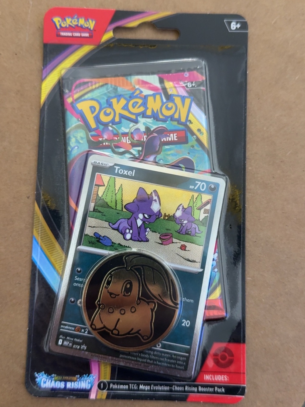 Pokemon Trading Card Pack with Purple Toxel Card and Gold Coin